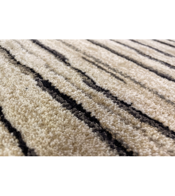 Slide Serge Lesage Tapis